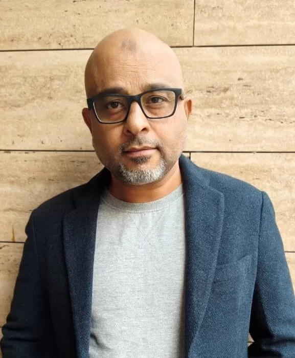 Tariq Husain — Founder and Director